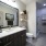 Bathroom with glass shower enclosure and spacious countertop