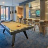 billiards table in brightly lit clubhouse
